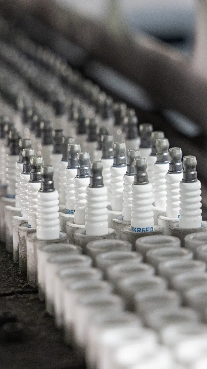 Spark plugs moving through the Tongde production line