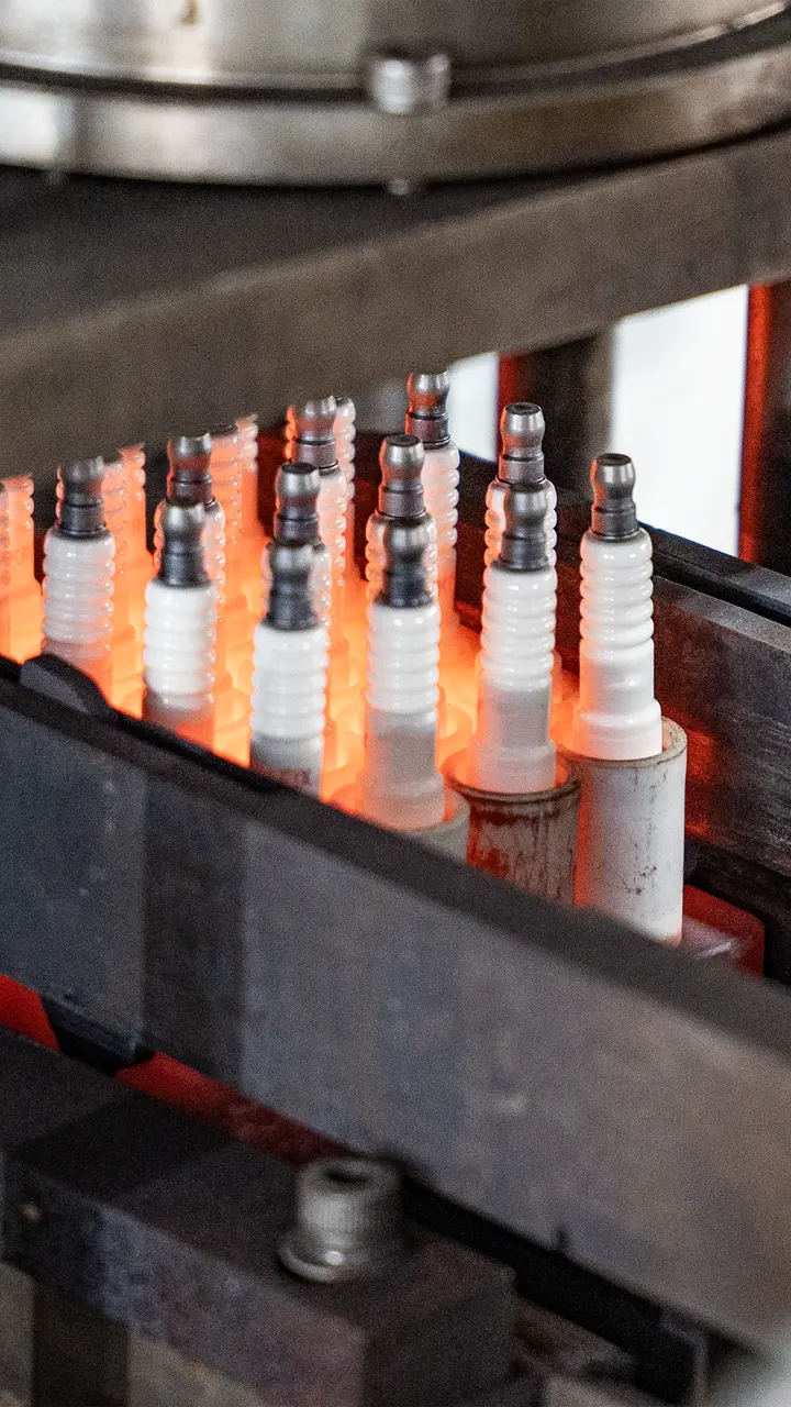 Spark plug heat treatment process at Tongde factory